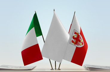 Flags of Italy and South Tyrol with a white flag in the middle