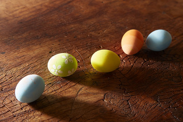 color eggs on wood
