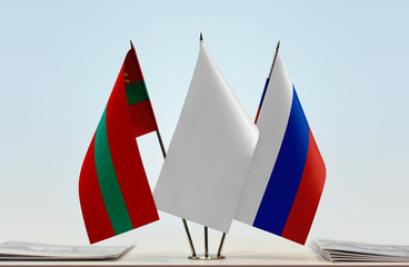 Flags of Transnistria and Russia with a white flag in the middle