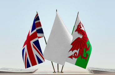 Flags of Great Britain and Wales with a white flag in the middle