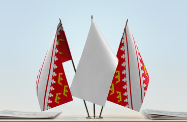 Two flags of Alsace with a white flag in the middle