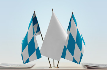 Two flags of Bavaria Free State with a white flag in the middle