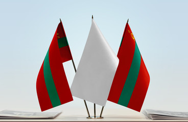 Two flags of Transnistria with a white flag in the middle