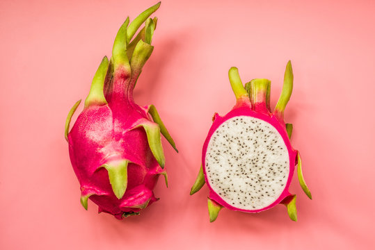 Creative layout made of pitahaya . Flat lay. Food concept. dragonfruit on pink background.