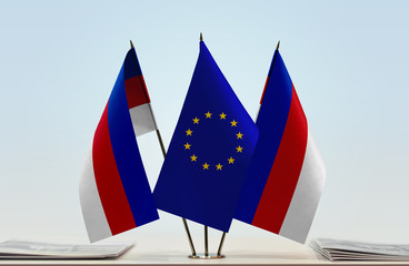 Two flags of Lusatia and European Union flag between