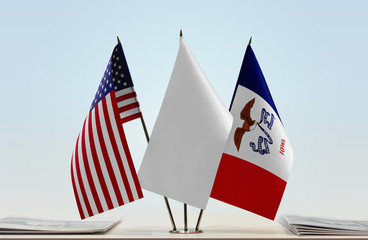 Flags of USA and Iowa with a white flag in the middle