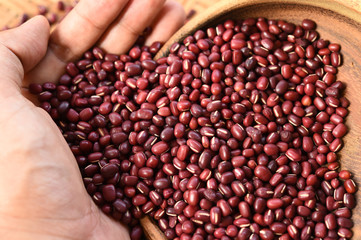 close up of red beans in wooden bowl