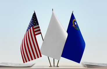 Flags of USA and Nevada with a white flag in the middle