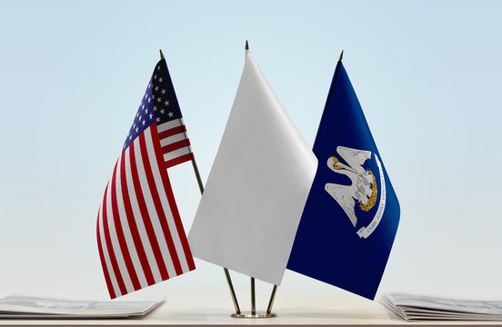 Flags of USA and Louisiana with a white flag in the middle