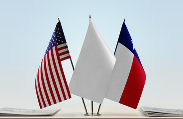 Flags of USA and Texas with a white flag in the middle