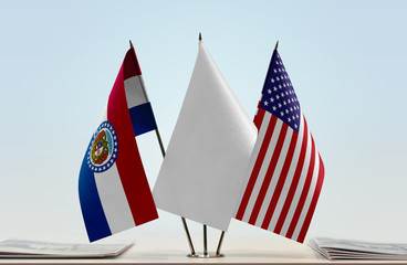 Flags of Missouri and USA with a white flag in the middle