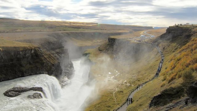 view on valley with waterfall Gullfoss and Hvita river in Iceland in clear weather in autumn day