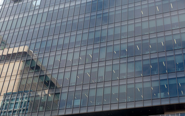 Fototapeta na wymiar Skyscraper bottom view