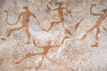 image of ancient people on the wall of the cave ocher. history. archeology.