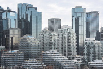 Obraz na płótnie Canvas Modern city skyline during the day. Calgary, Canada