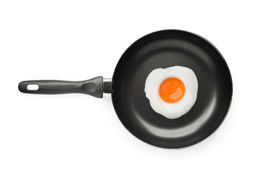 Frying pan with fried egg isolated on white background on top view object cooking design