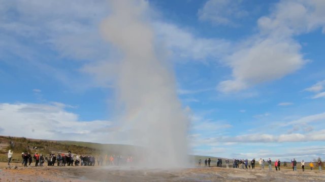eruption of powerful geyser Strokkur in Iceland in a Haukadalur valley area, in sunny fall day