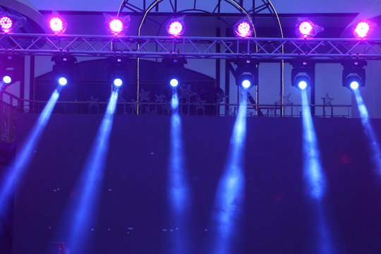 Performance moving lighting on construction light beam ray