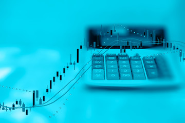 Double Exposure of Business Report calculator and investment graph with copy space