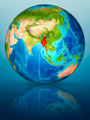 Myanmar on Earth on reflective surface