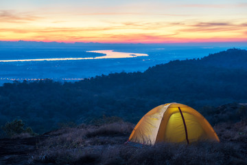 Fototapeta na wymiar Tent of Travelers on mountain in the morning Thailand