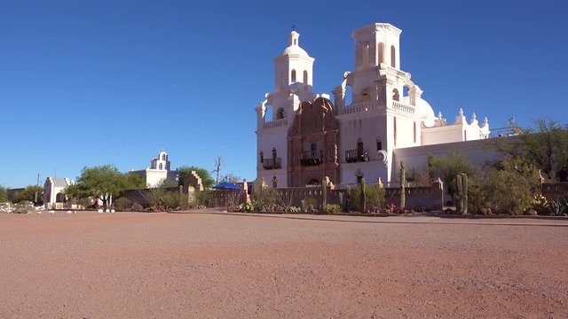 A beautiful establishing shot of Mission San Xavier del Bac, a historic Spanish Catholic mission near Tucson, Arizona.