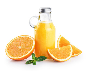 Bottle with orange juice, oranges and mint isolated on white background.