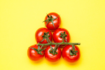 tomatoe ripe on yellow background