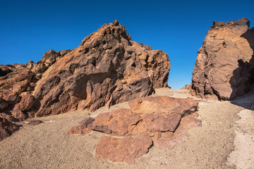 Fototapeta na wymiar Rocky landscape in Teide national park. This natural scenary was used for the fim clash of Titans, Tenerife, Canary islands, Spain.