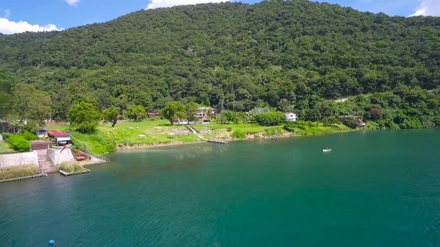 Aerial over the shoreline of Lake Amatitlan in Guatemala.