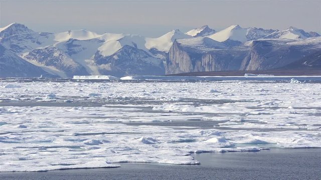 Drifting past sea ice looking for polar bears in Hecla and Griper Trough off Baffin Island, Nunavut, Canada.