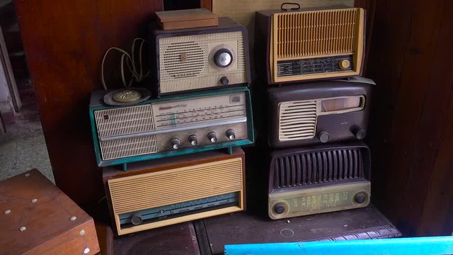 Old fashioned radios are stacked in a shop in the old city of Havana, Cuba.