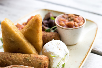 Cooked breakfast with vegetarian food trendy hipster restaurant high end