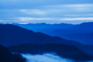 Blue mountains above a sea of clouds in Sagada, Mountain Province, Philippines