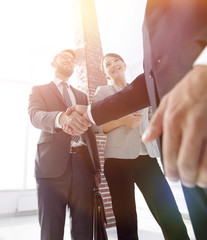 friendly handshake of business people.