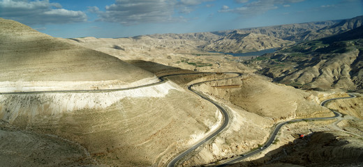 Panoramic view of the King Highway ascending the road north of the Wadi Mujib reservoir in Jordan.