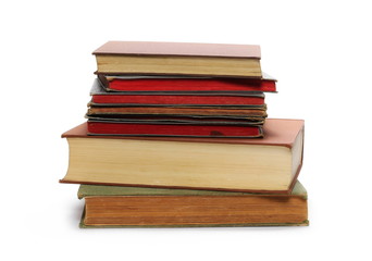 Stack of old antique big books isolated on white background