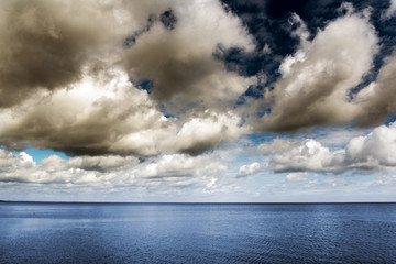Fototapeta premium Clouds over gulf of Riga, Baltic sea.
