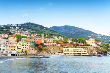 Fototapeta na wymiar View from the sea to the Bogliasco - fishermen's Village of the Ligurian Riviera