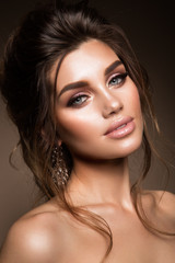 Fototapeta premium Beautiful woman with professional make up and hairstyle