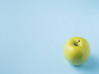 Fresh fruit Apple isolated on blue background