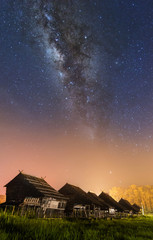 milky way galaxy during starry night. image contain soft focus and noise due to long expose and...
