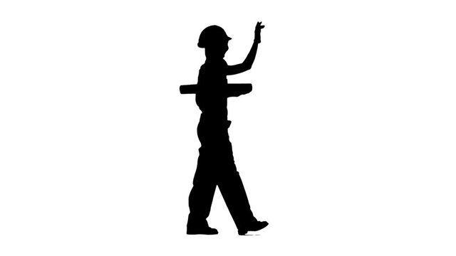 Designer of the construction site carries a drawing. Silhouette. White background. Side view