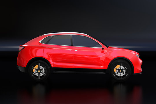 Side view of metallic red Electric SUV concept car isolated on black background. 3D rendering image. 