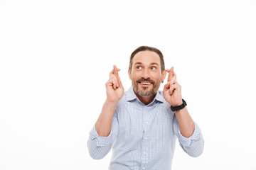 Fototapeta premium Portrait of a happy mature man dressed in t-shirt