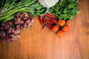Top view of Vegetables on wooden background. copy space