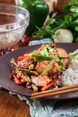 Kung Pao chicken with peppers and vegetables