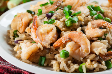 Fried rice with shrimp and vegetables served on a plate