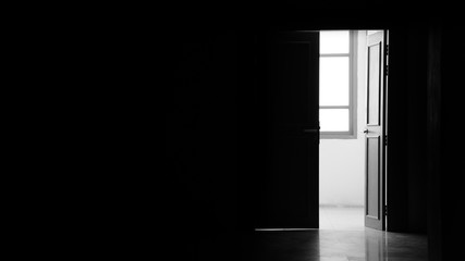 open door in the room - monochrome