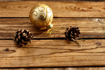 Christmas bauble and a bump on a wooden background./Celebration Event, Christmas, Christmas Decoration, Christmas Ornament, Christmas Tree